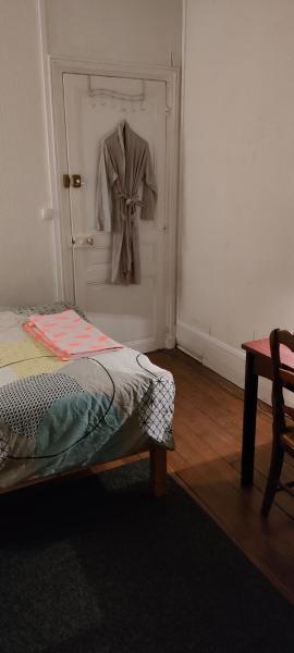 private room III for 1 person maximum in our family apartment in Paris 10, near La Gare du Nord